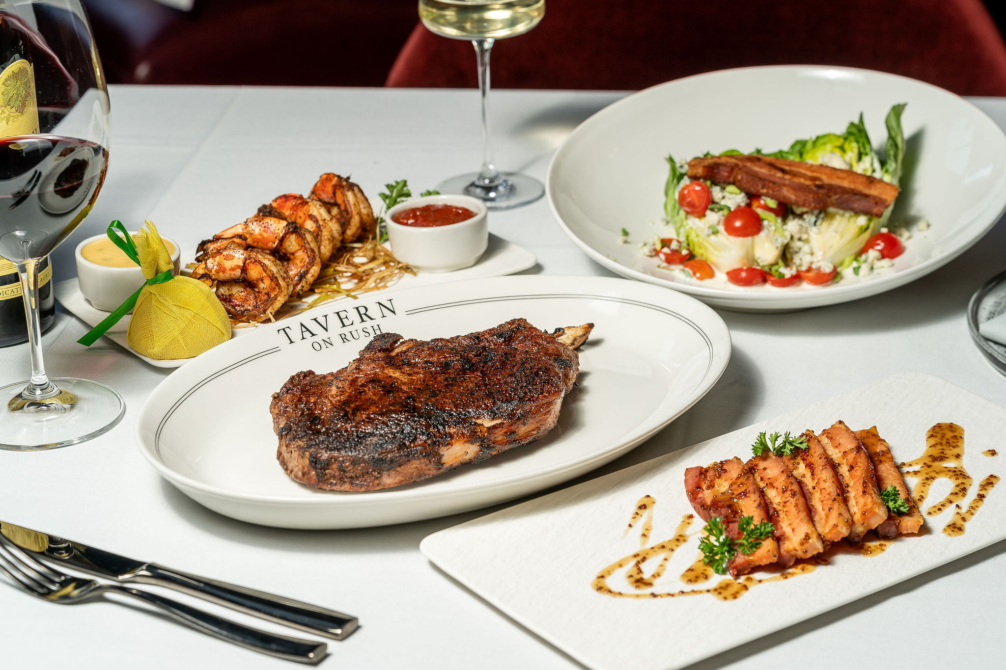 Steak, shrimp and wedge salad on Tavern on Rush plates