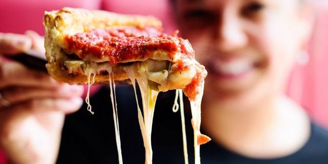 Cheese pull from a Giordano’s deep-dish pizza