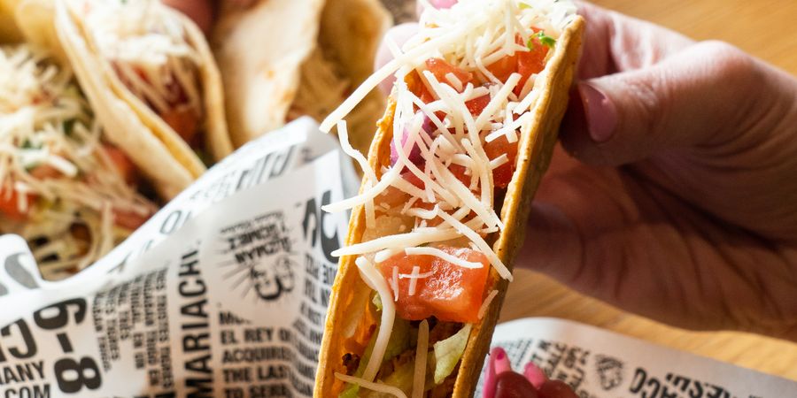 Guzman y Gomez tacos wrapped in printed paper